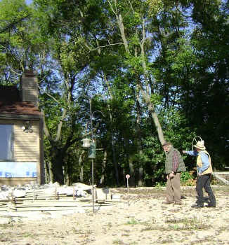 Two members of the Board of Adjustment looking at a proposed project under construction